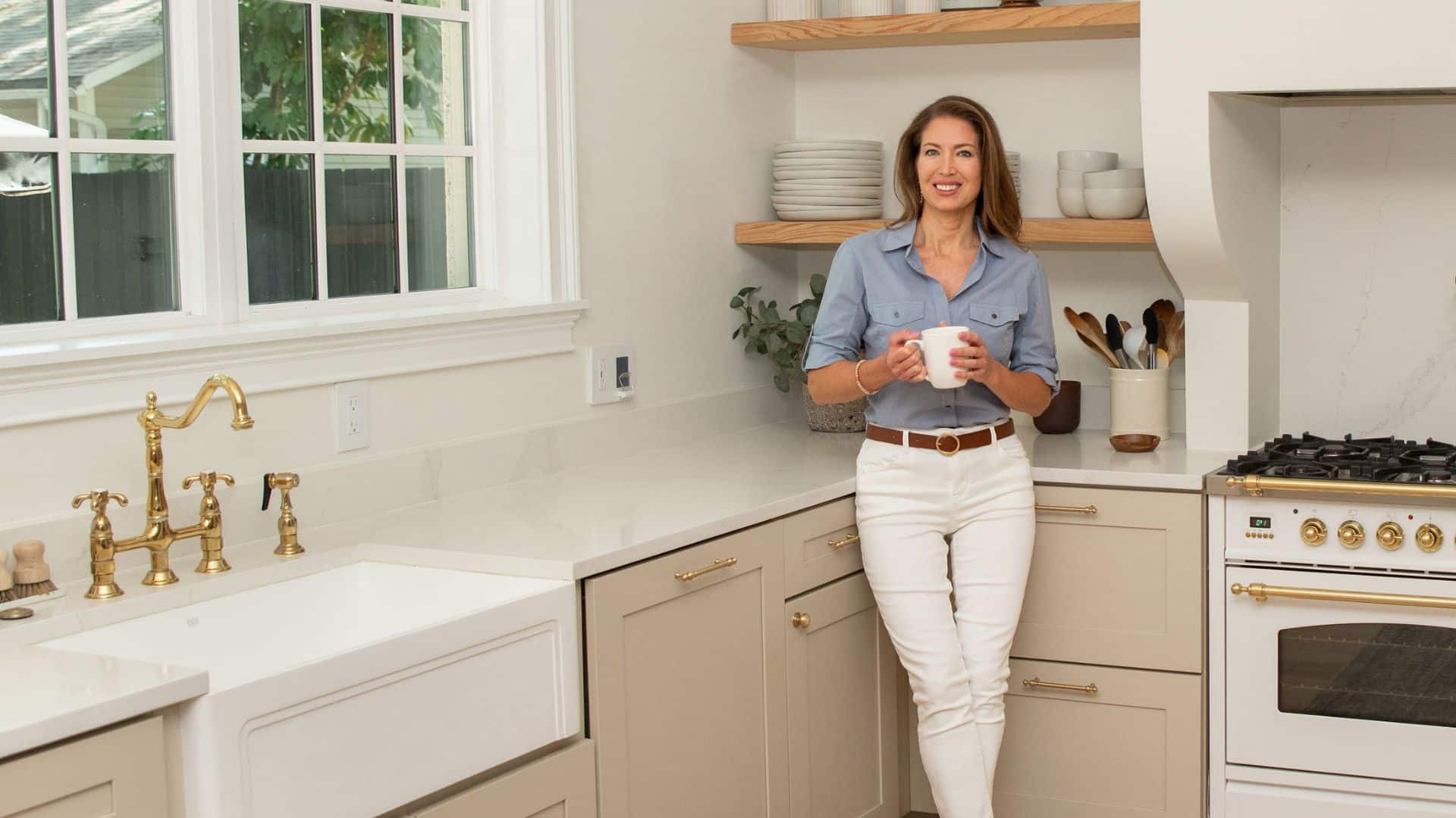 Drisana organizing a Tampa kitchen Professional home organizer creating a functional, organized kitchen space.